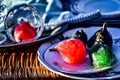 Pink Mexican candied pears in vintage glass dessert dishes