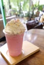 Pink milk cold drink for summer so delicious, sweet cold strawberry fresh milk and bread with fluffy whipped cream Royalty Free Stock Photo