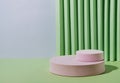 Pink Minimal Geometric Disc Podium Stand for Product Demonstration On Green Corrugated