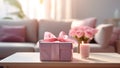 Pink Mother Day gift box on beige living room background. Ribbon-tied box. Special present occasions birthday, valentine,