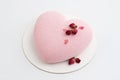 Pink mousse cake in the shape of a hear