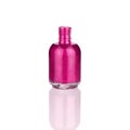 Pink nail polish glass bottle & mirror reflection white background isolated closeup, opened varnish package & shadow, one lacquer