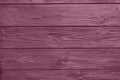 Pink natural wooden background. Wood planks. Violet natural wooden background.