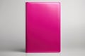 A pink notepad for notes stands on a white background