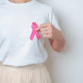 Pink October Breast Cancer Awareness month, woman with pink Ribbon in hospital for support people life and illness. National Royalty Free Stock Photo