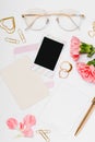 Pink Office Card And Polaroid With Desk Accessories In A White Background