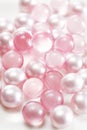 Pink oil bath pearls Royalty Free Stock Photo