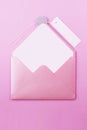 Pink letter envelope on a light purple background.