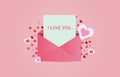 Pink opened envelope with message I LOVE YOU. Letter on valentines day and heart on colored background. top view valentines day Royalty Free Stock Photo