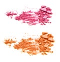 Pink and orange crushed eyeshadows isolated on white background. Royalty Free Stock Photo