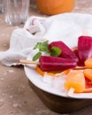 Pink and orange popsicle on grey stone background. Royalty Free Stock Photo