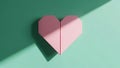Pink Origami Heart on Green Background Royalty Free Stock Photo