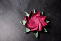 Pink Origami Lotus Flower - Paper Art on Textured Background