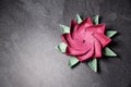 Pink Origami Lotus Flower - Paper Art on Textured Background
