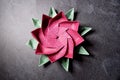 Pink Origami Lotus Flower - Paper Art on Textured Background Royalty Free Stock Photo