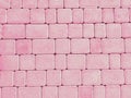 Pink outdoor stone block tile floor background and texture. Royalty Free Stock Photo