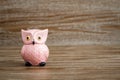 Pink Owl Figurine on Wooden Background Royalty Free Stock Photo