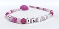 A pink pacifier chain for girls with name Emilia