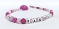 A pink pacifier chain for girls with name Sandra