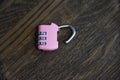 Little metal padlock on rope Royalty Free Stock Photo