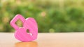 A pink padlock in shape of a heart. Heart health. The secret of relationships and the rules of a strong family. Strong love affair Royalty Free Stock Photo