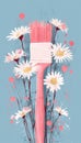 Pink paintbrush with blooming daisies on blue background representing creativity and nature