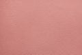 Pink painted stucco wall. Background texture