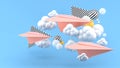 Pink paper airplane amid clouds on blue background and colorful balls.