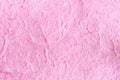 Pink paper background with fiber structure. Royalty Free Stock Photo