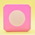 pink paper box with yellow circle on yellow background, package design Royalty Free Stock Photo