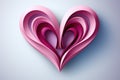 A pink paper cut heart on a blue background. Royalty Free Stock Photo