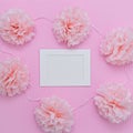 Pink paper cuted flowers and white frame with white blank