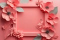 Pink paper flowers and leaves creating a frame around a rectangular empty space on a monochromatic background Royalty Free Stock Photo