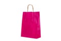 A pink paper gift bag with handles Royalty Free Stock Photo