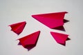 Pink Paper Plane or Paper Airplane Origami on white Background Top View with Place for Text, business competition Royalty Free Stock Photo