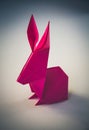 Pink paper rabbit origami isolated on blank background Royalty Free Stock Photo