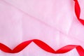 Pink paper texture background with red ribbon Royalty Free Stock Photo