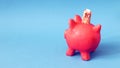 pink papier mache piggy bank with 10 Euros Royalty Free Stock Photo