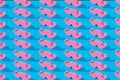 Pink pastel mustache pattern and on a blue background. Father day.