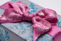 Pink Patterned Bow on Floral Gift Box - Festive & Decorative Present Royalty Free Stock Photo