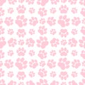 Pink paw print seamless repeating background pattern. Cat or dog footprints. Vector illustration. Royalty Free Stock Photo