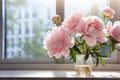 A pink peony by a sunlit window, offering copy space