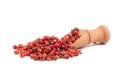 Pink pepper, Red peppercorns in a wooden spoon Royalty Free Stock Photo