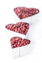 Pink Peppercorns Heart Shape (on white) Royalty Free Stock Photo