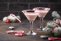 Pink peppermint martini with candy cane rim Royalty Free Stock Photo