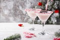 Pink peppermint martini with candy cane rim Royalty Free Stock Photo