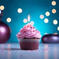 Pink perfection Birthday cupcake with burning candle on blue background Royalty Free Stock Photo