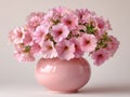 Pink petunia flowers in ceramic vase Royalty Free Stock Photo