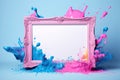 Pink photo border mirror in colourful paint splash on blue background