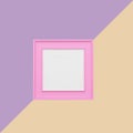 Pink picture frame on purple and orange pastel background. Minimal concept idea. Royalty Free Stock Photo